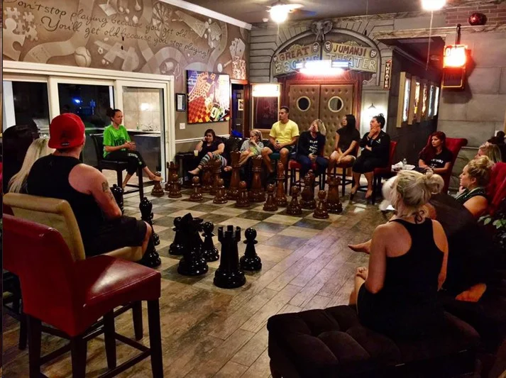 The formal living room of The Great Escape Lakeside - with giant chess