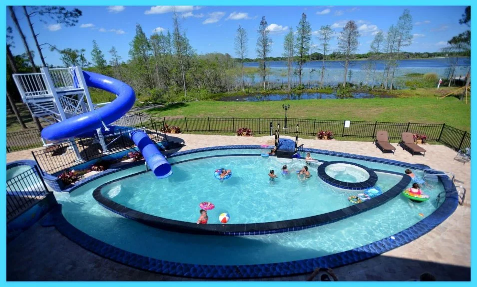 Swimming Pool with Waterslide and Lazy River at this Vacation Rental near Disney World and Orlando, Florida : The Great Escape Lakeside